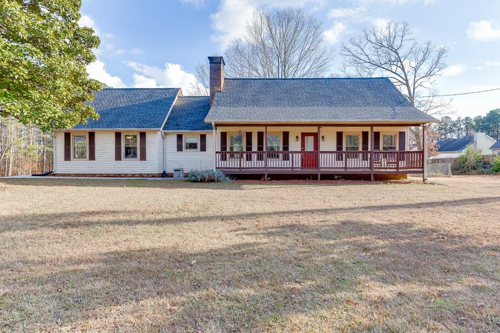 front view of a house with a yard