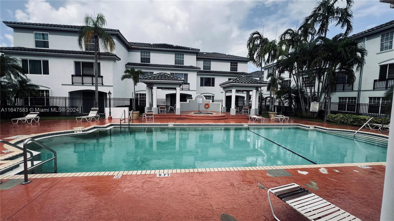 a view of a house with a swimming pool