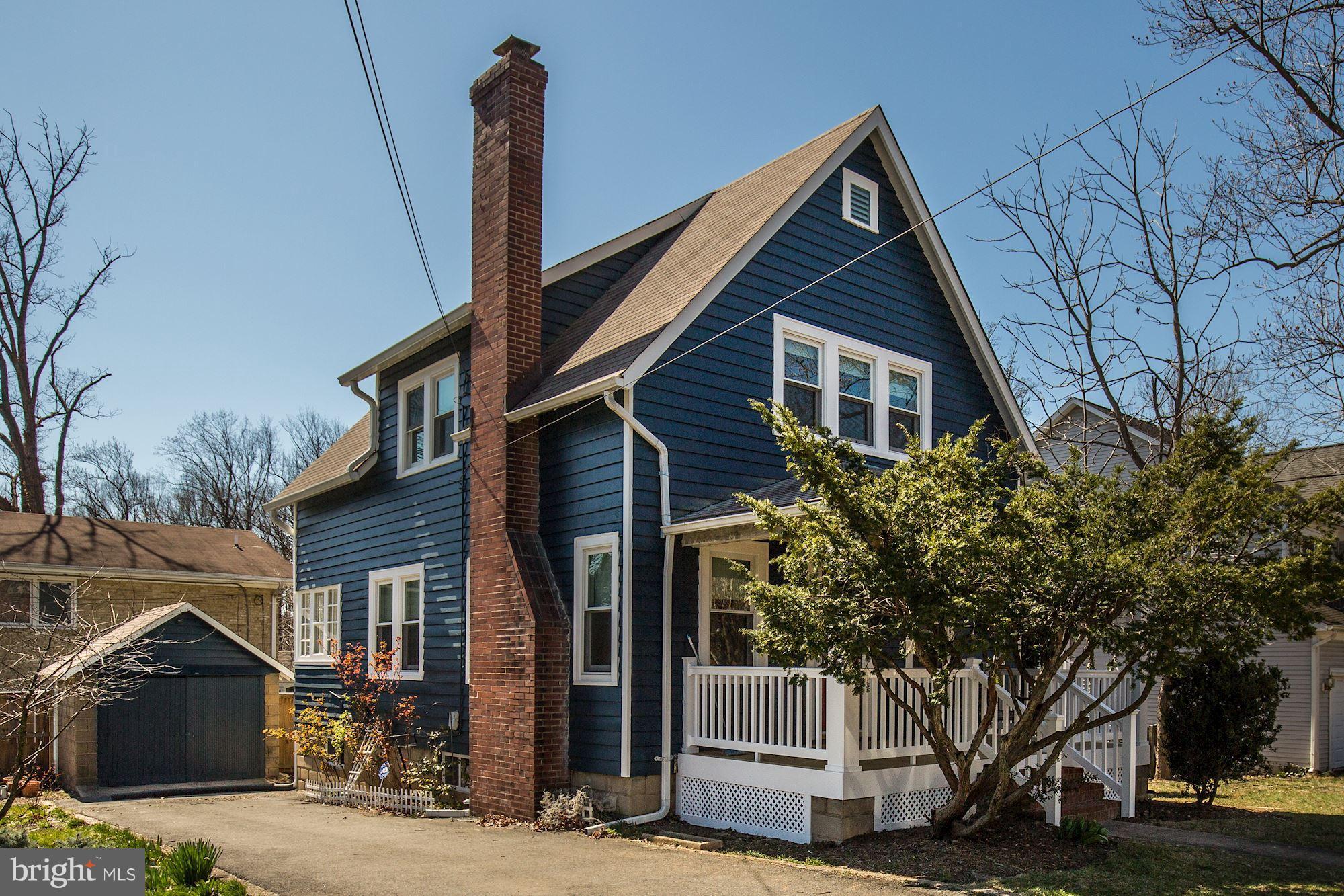 Picturesque craftsman home with porch &rear shed