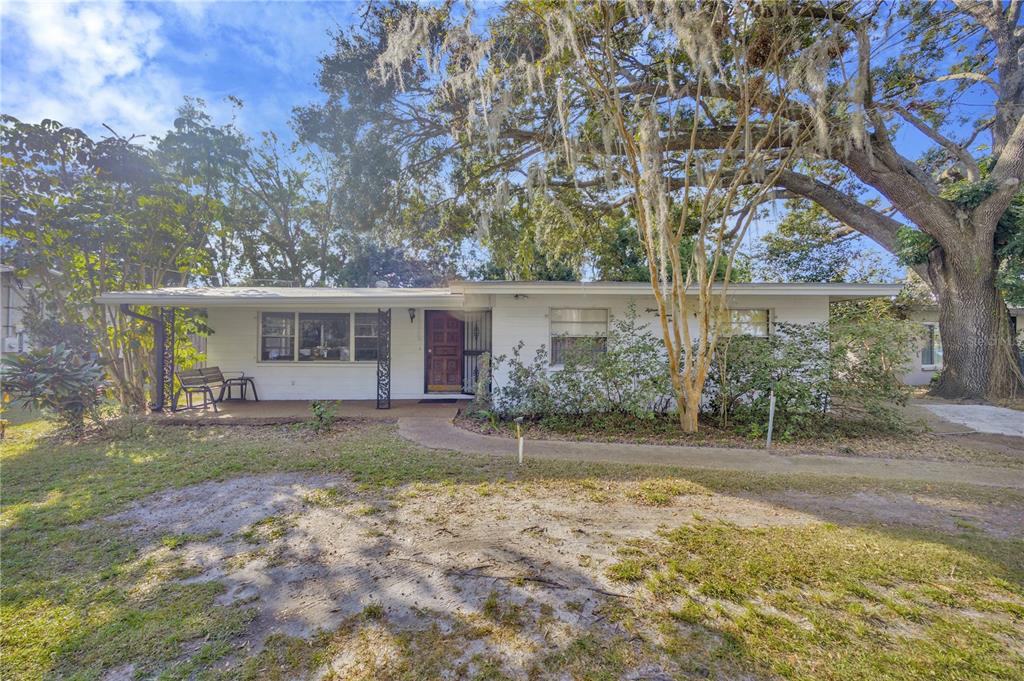 front view of a house with a yard