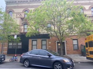 a car parked in front of a building