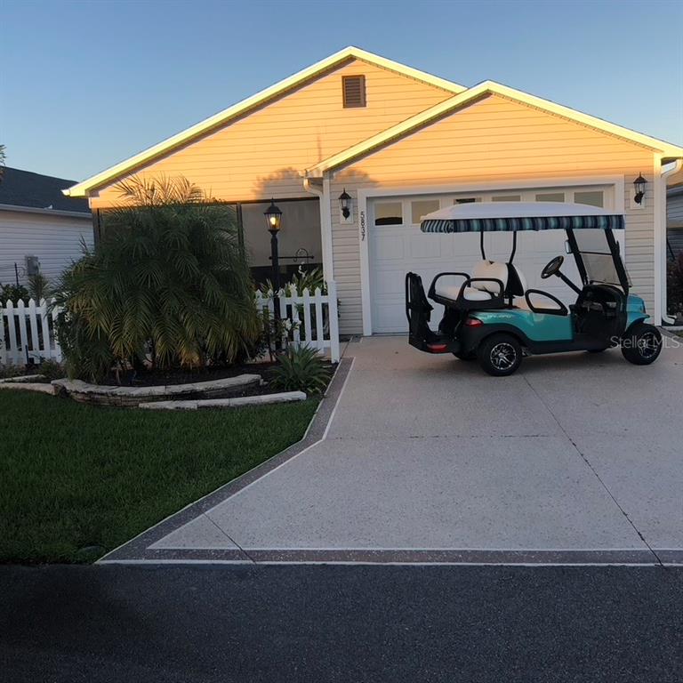 a car parked in front of a house