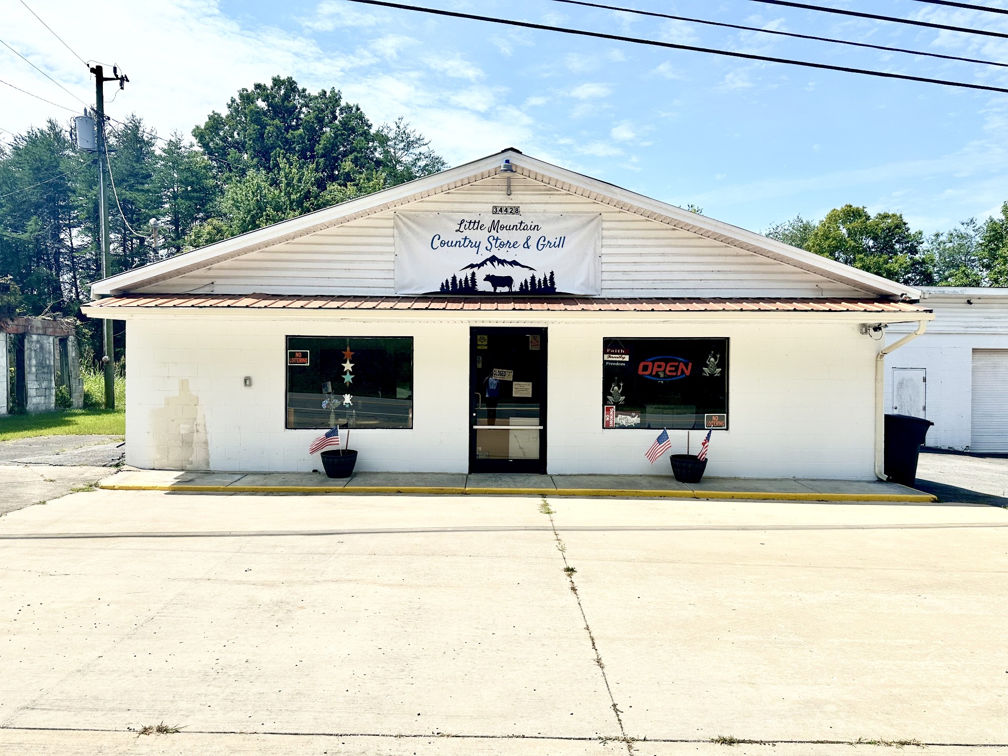 a front view of a house with garage