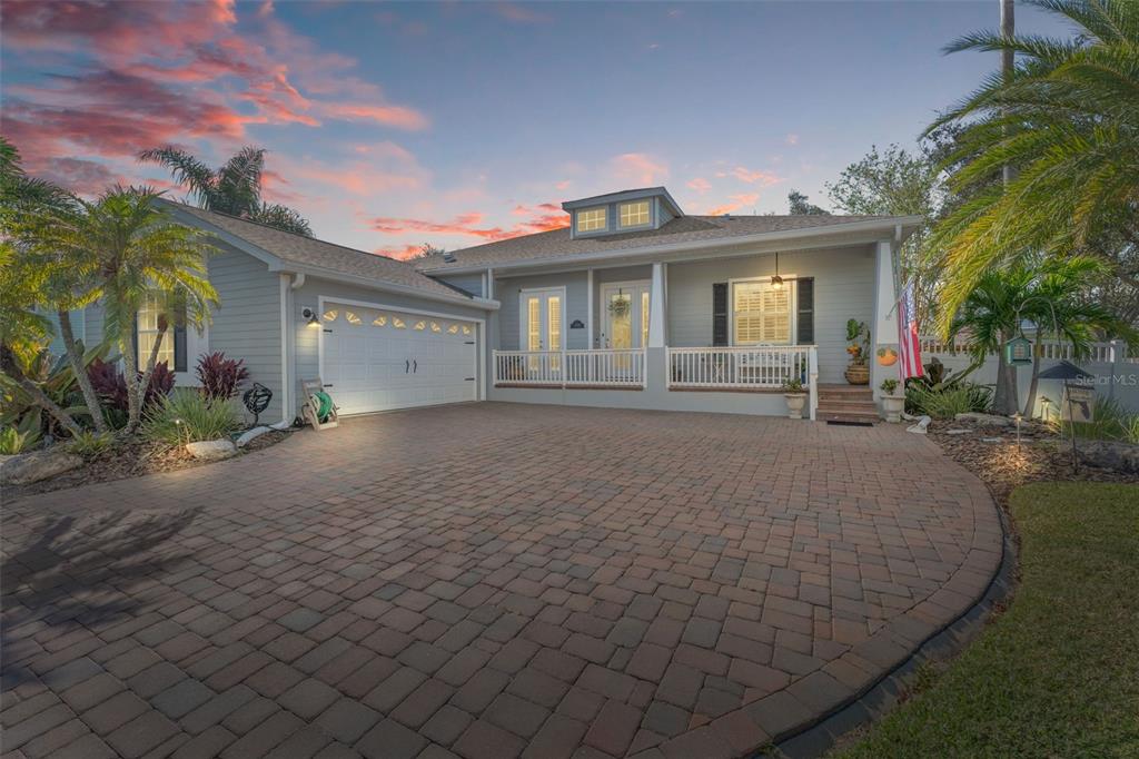 a front view of a house with yard