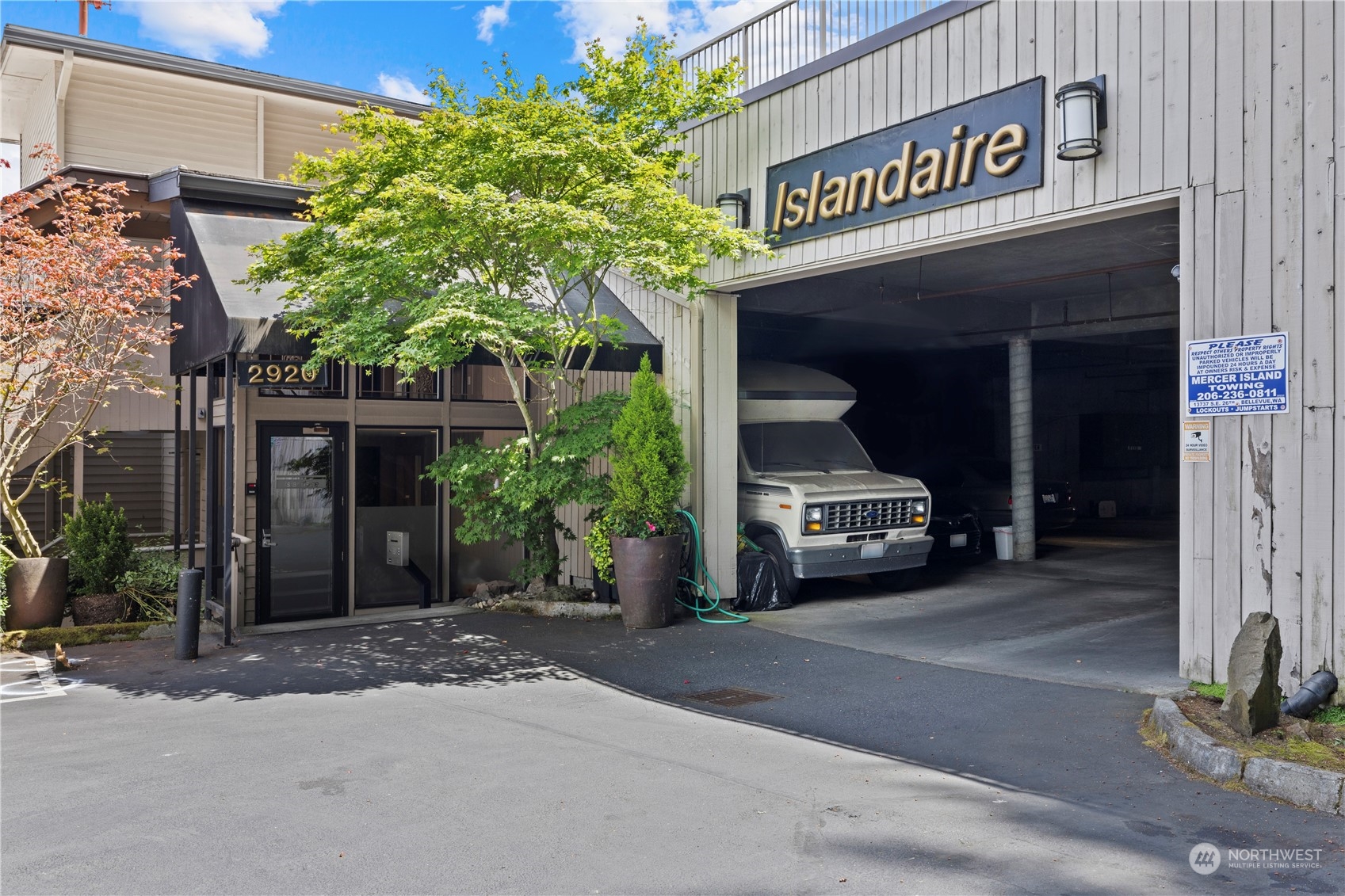 a view of a car park in front of building