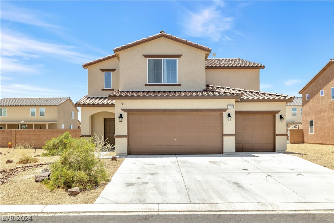 Home features PLENTY of parking with 3 car garage