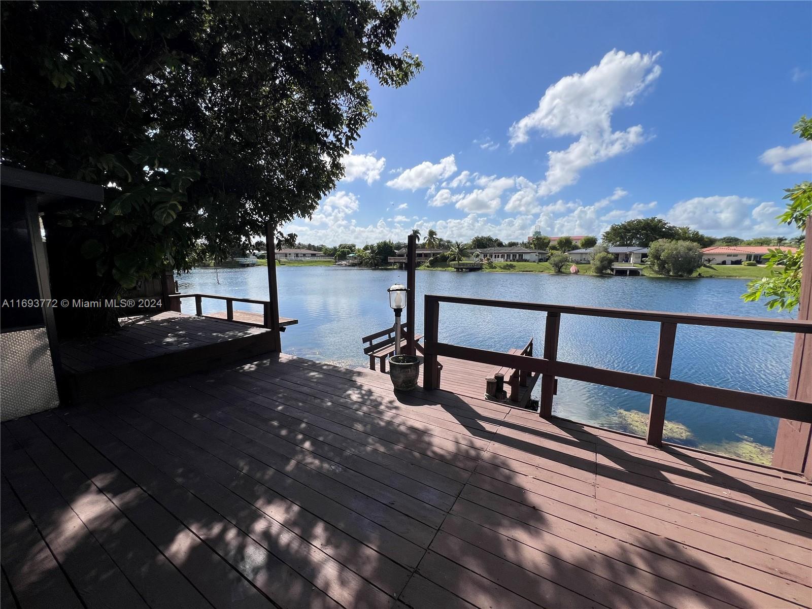 a view of a lake from a balcony