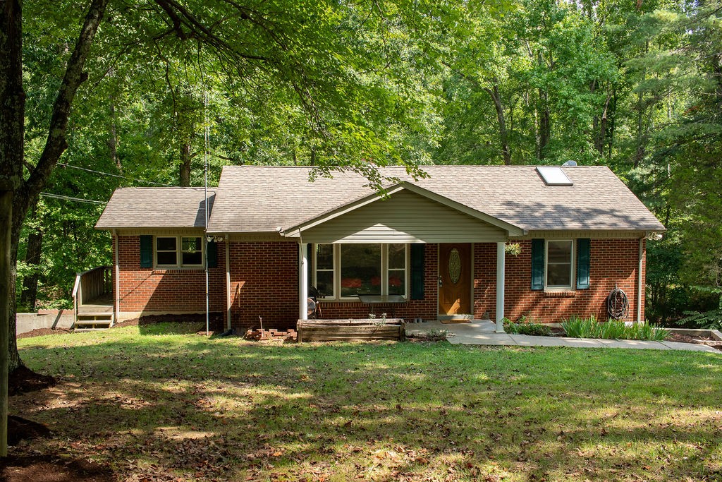 front view of a house with a yard