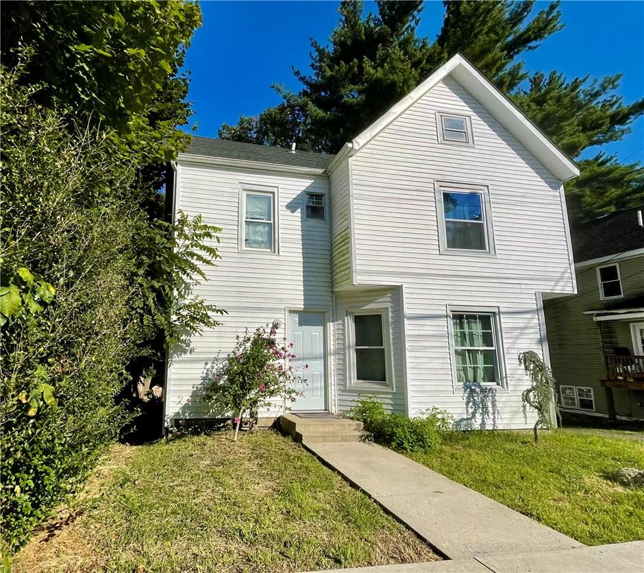 View of front of home with a front lawn