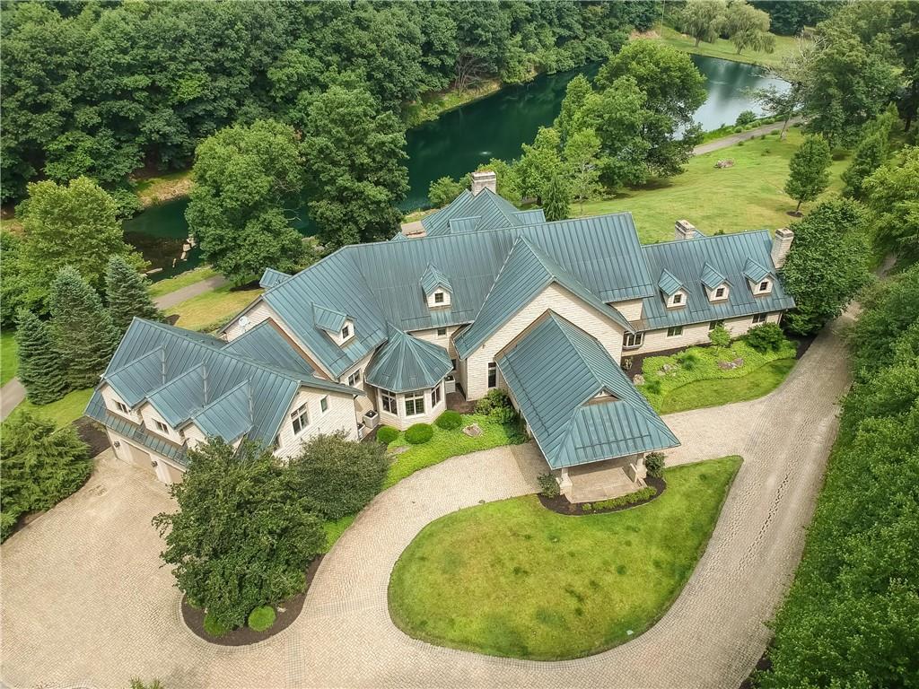 an aerial view of a house with garden