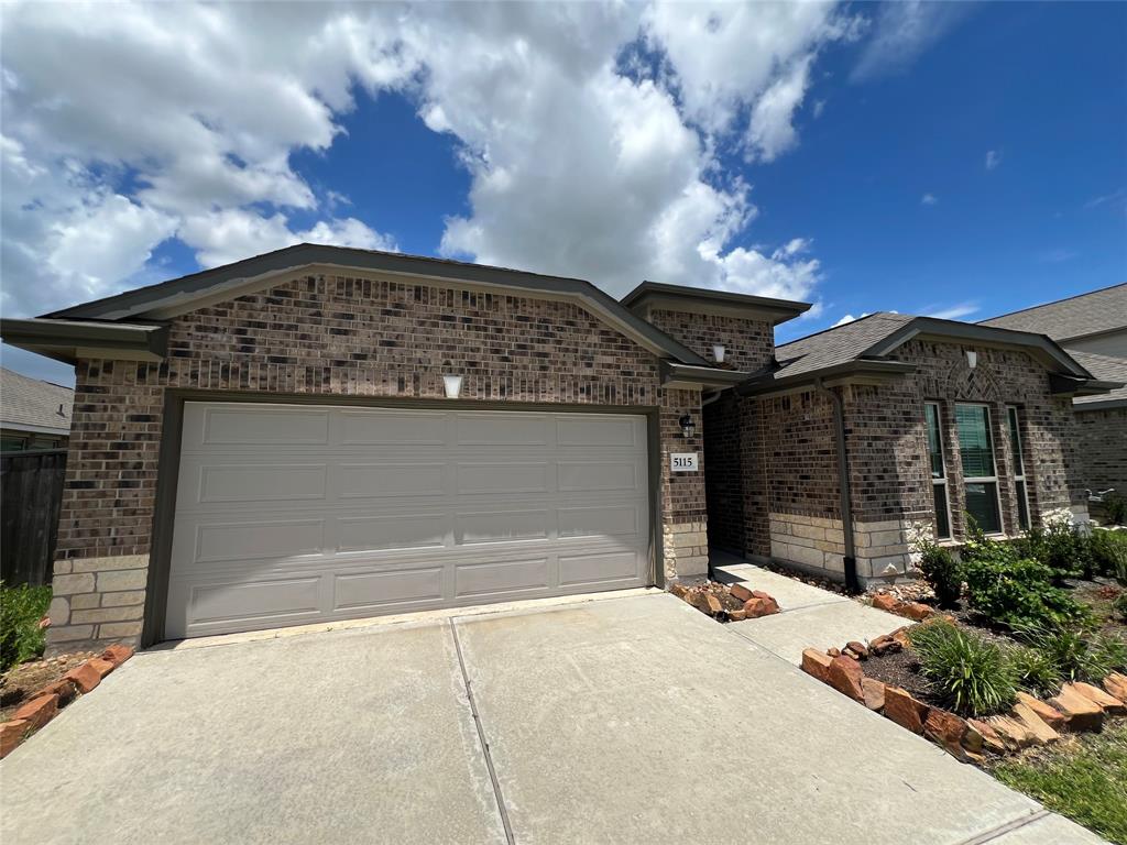 front view of a house with a garage