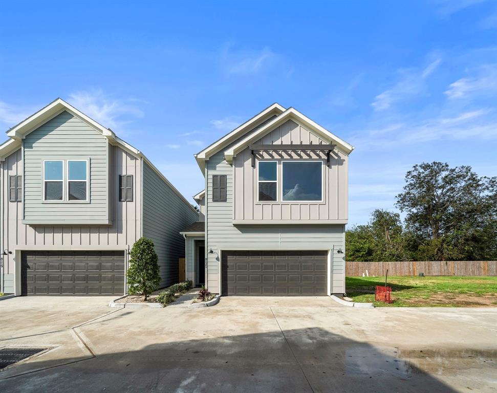 a front view of a house with a garage