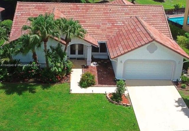 $770,000 | 20105 Back 9 Drive | Boca Greens