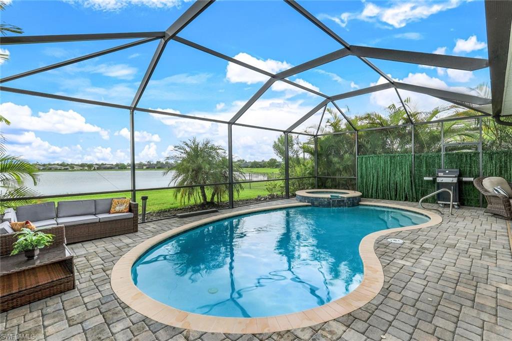 a view of outdoor space swimming pool and furniture