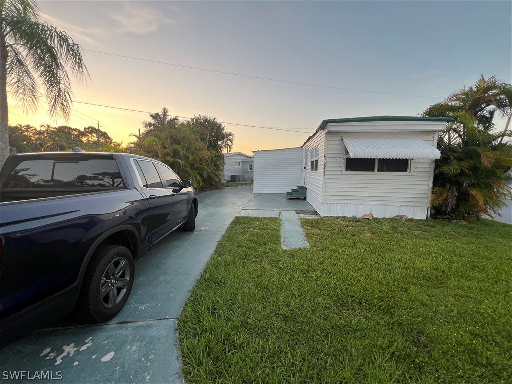 a view of a car in front of house