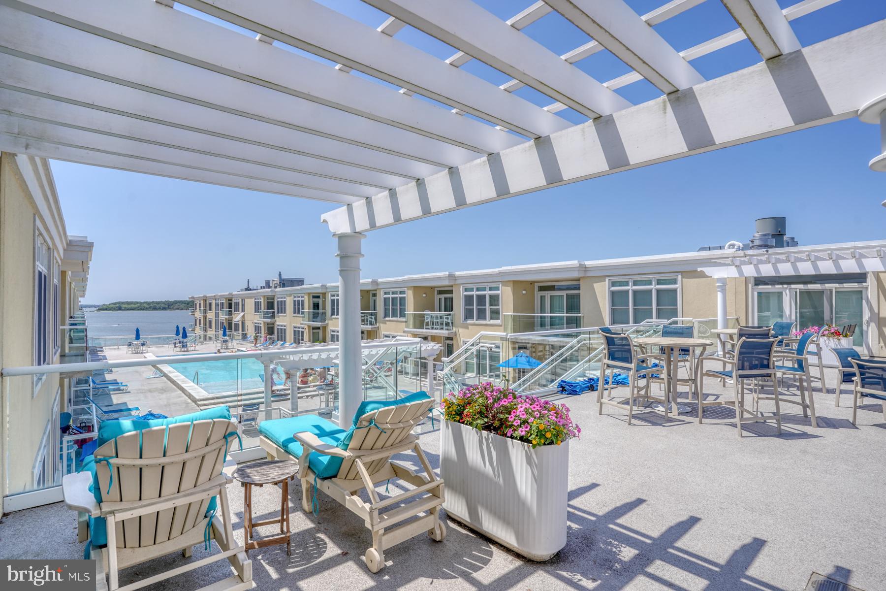 Patio overlooking the pool & Rehoboth Bay!