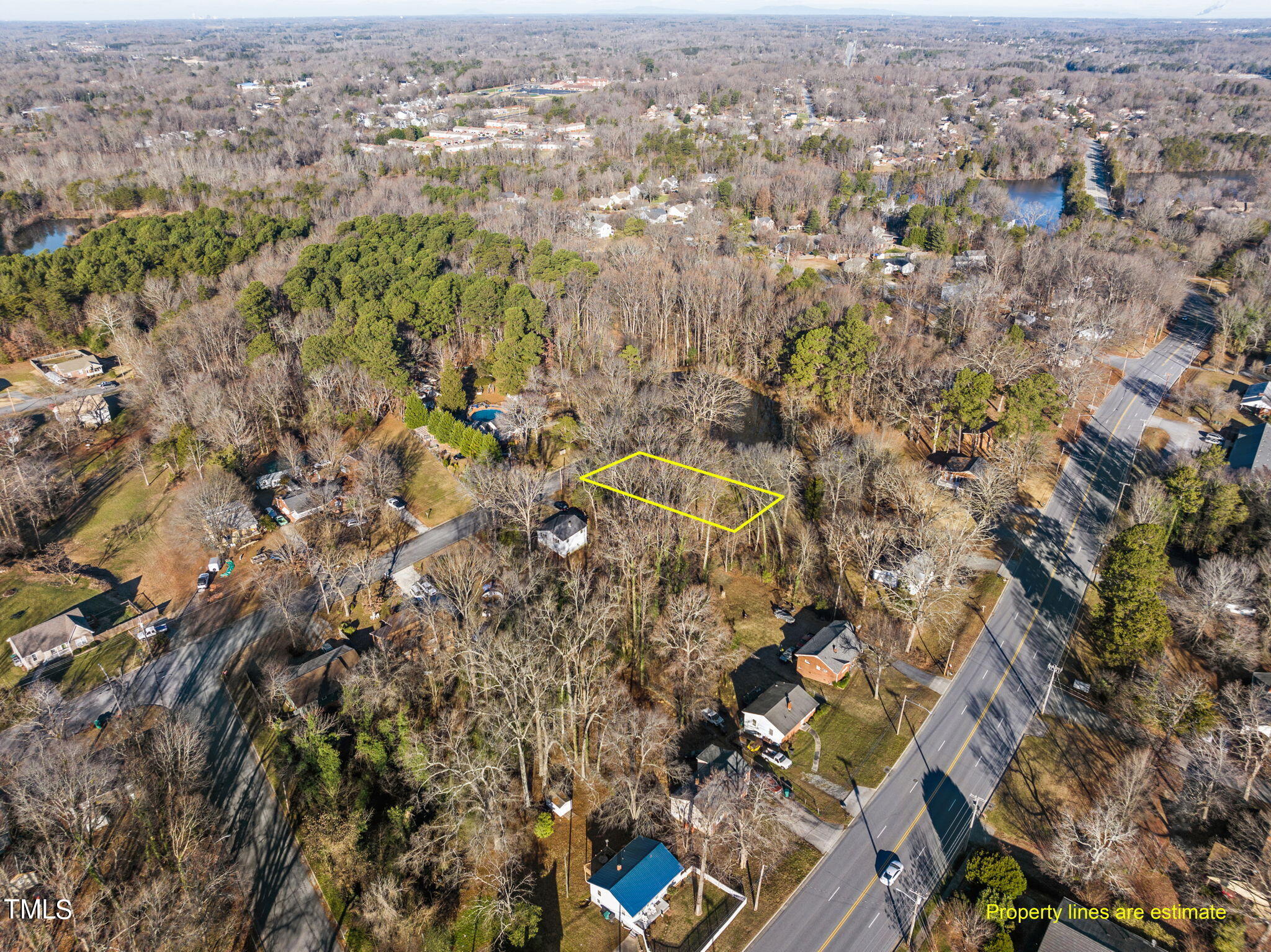 an aerial view of residential house with parking space