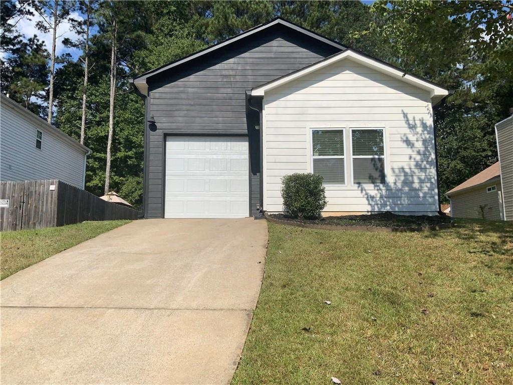 a front view of house with yard