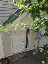 a view of backyard with potted plants