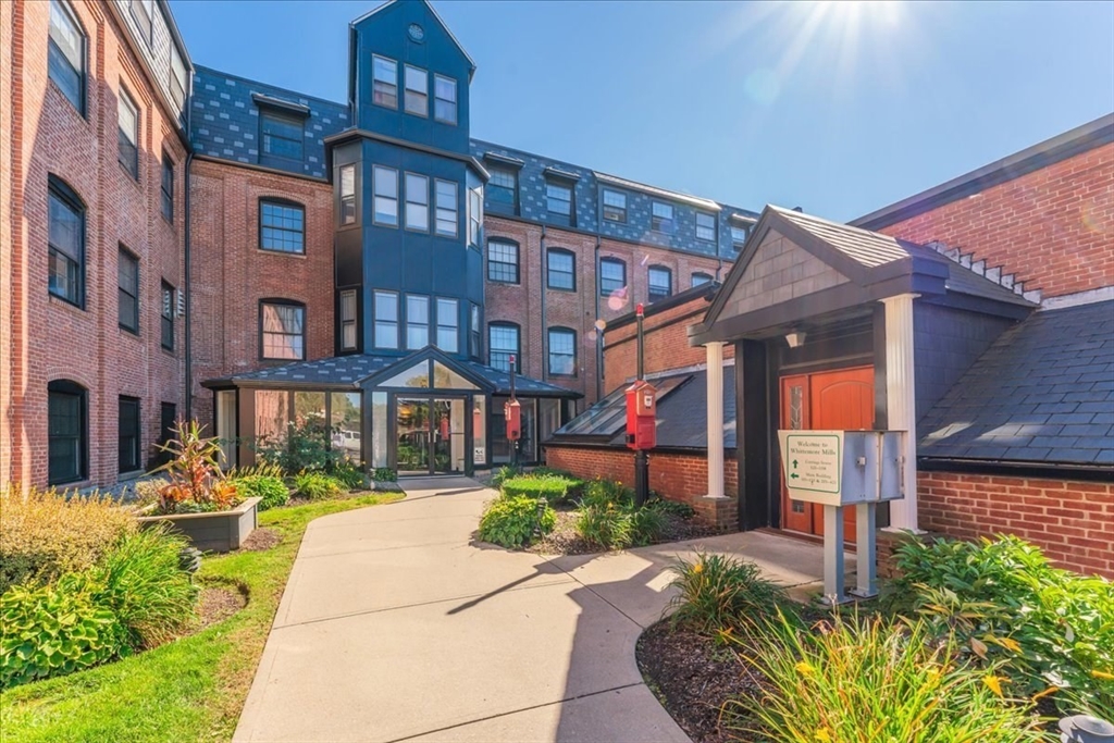 a front view of a multi story residential apartment building