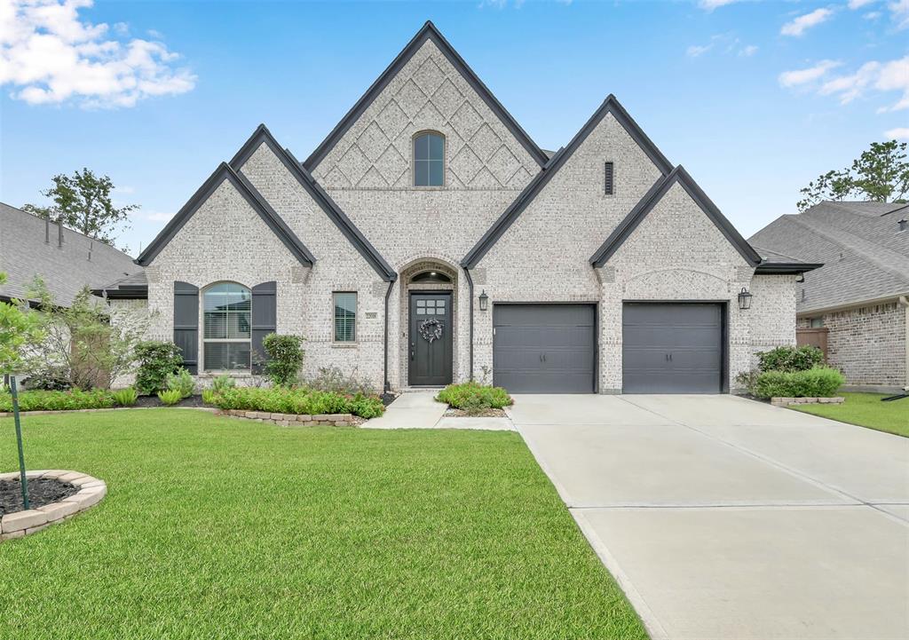 Welcome to luxury living at 22018 Breakwater Ln in The Highlands! This stunning 1 story home offers impeccable design, modern upgrades and a layout perfect for both relaxation and entertainment.