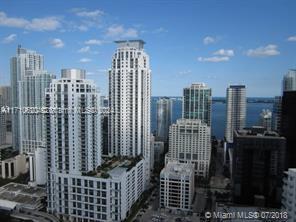 a view of city with tall buildings