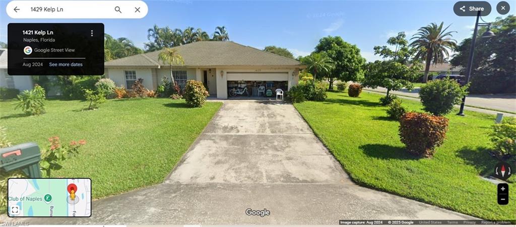 Ranch-style house featuring a front lawn