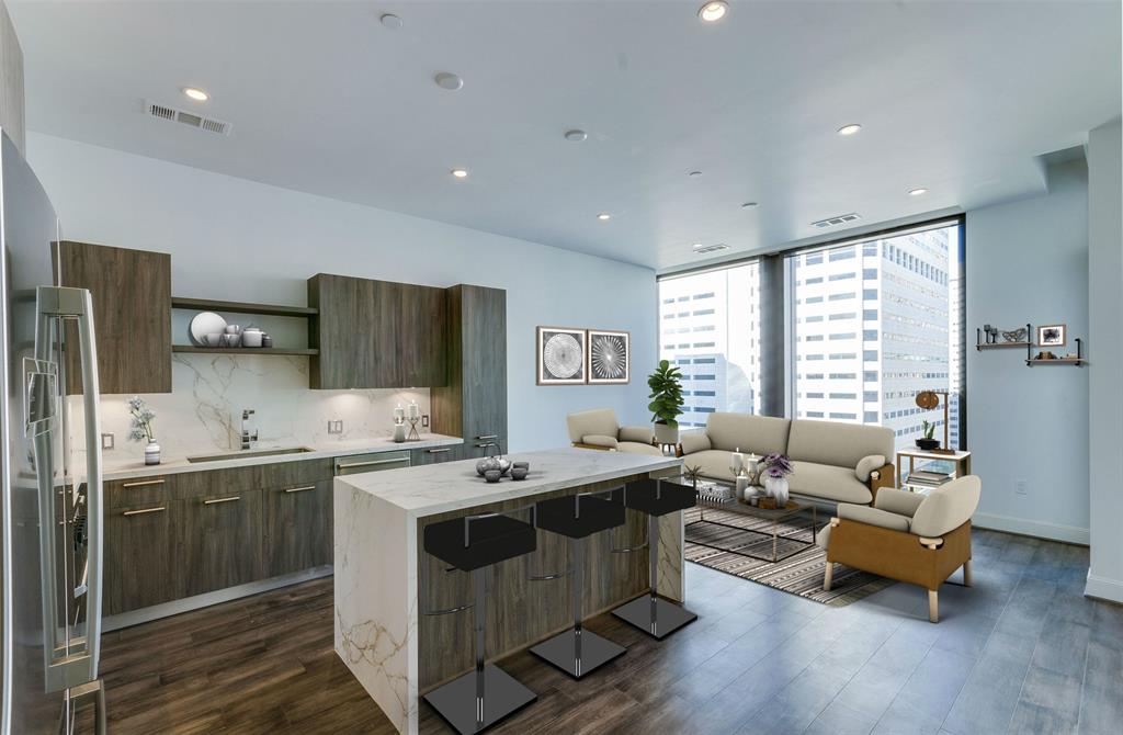 a kitchen that has a lot of cabinets a sink and a stove in it