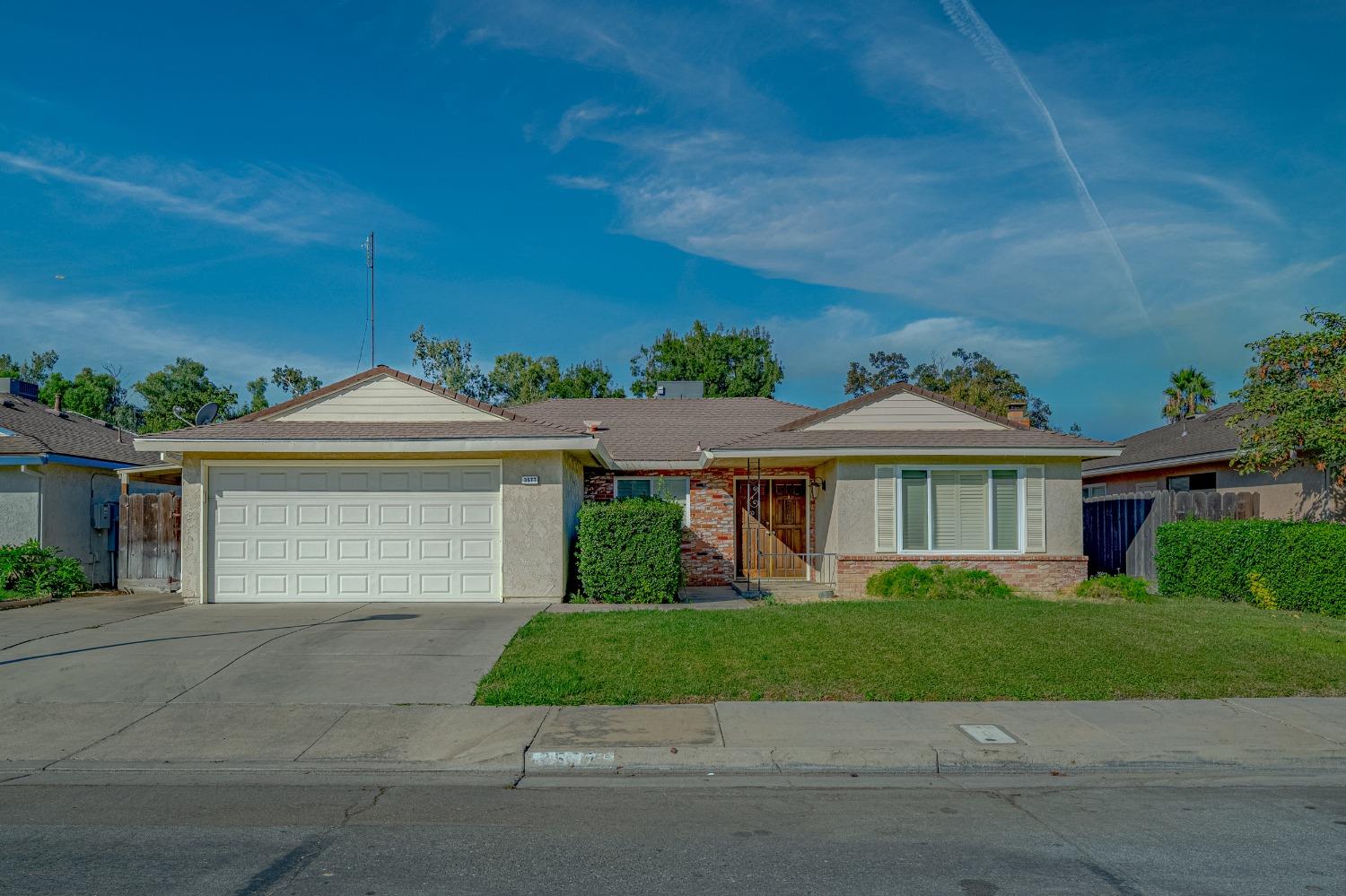 front view of house with a yard