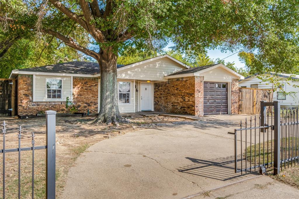 front view of a house with a small yard