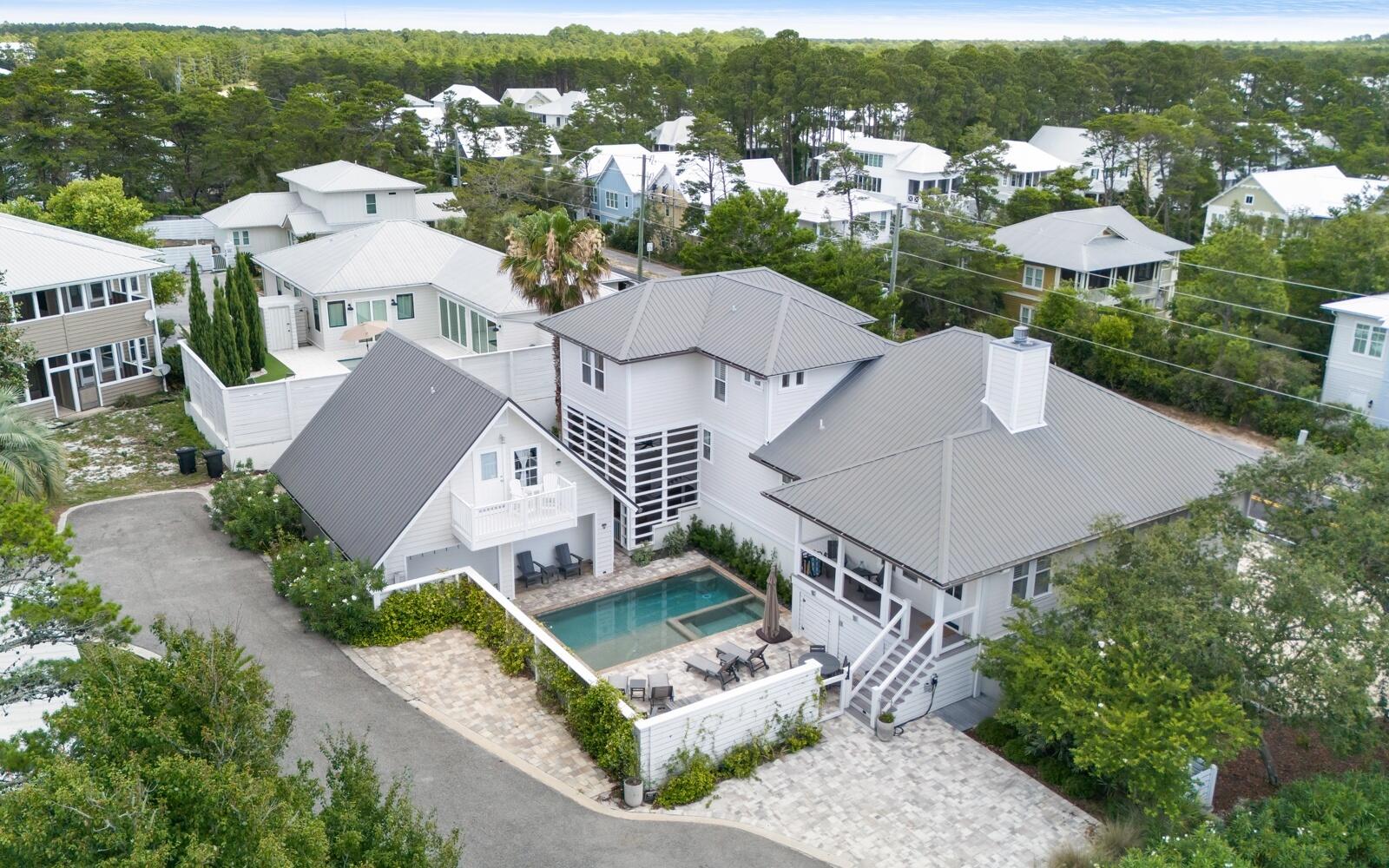 an aerial view of a house with a garden