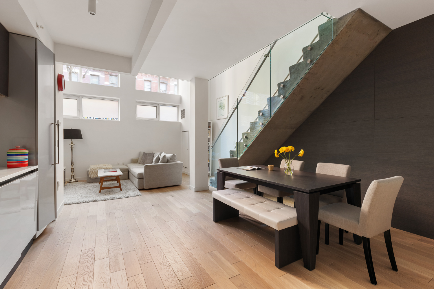 a living room with furniture and a table