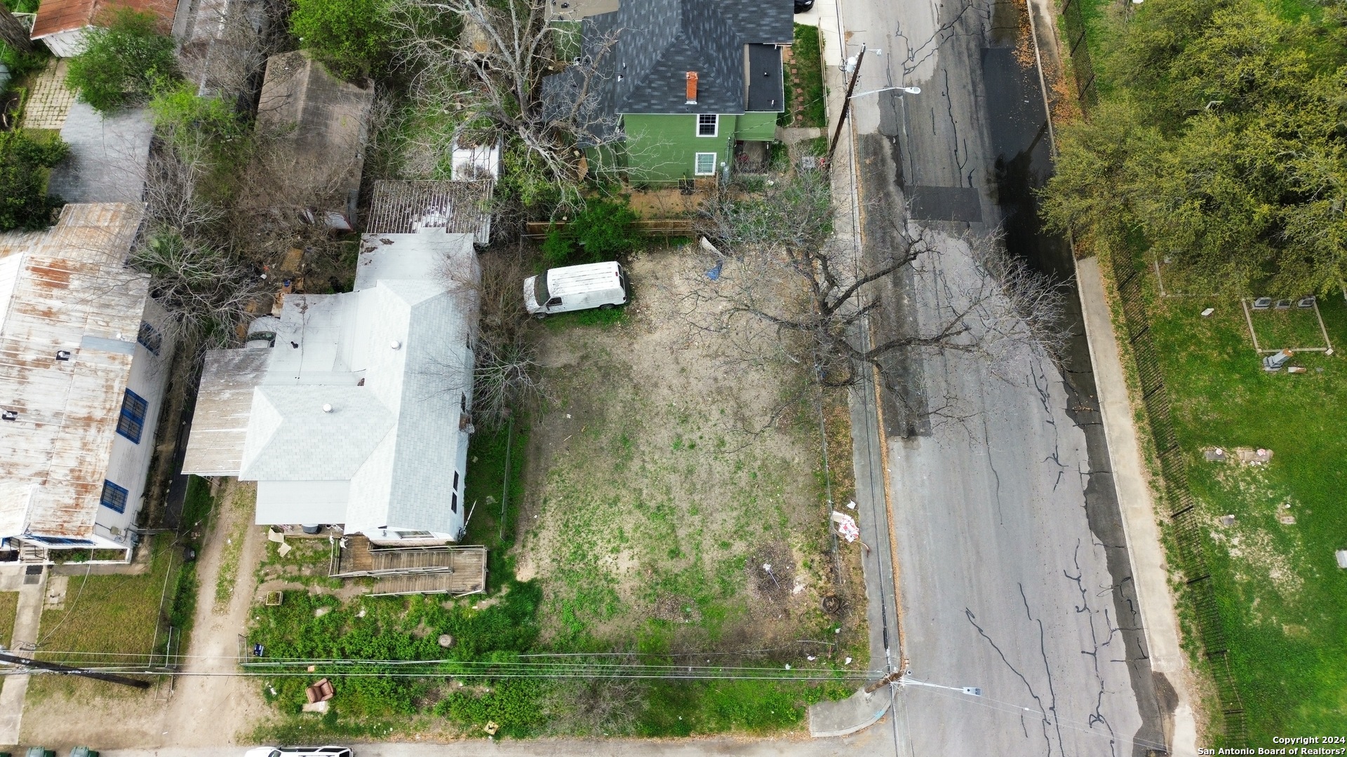 an aerial view of residential house with outdoor space