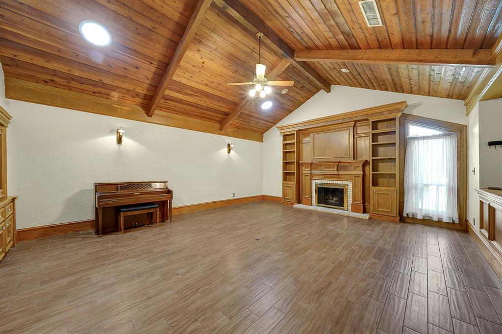 Living room fireplace and built in bookshelves