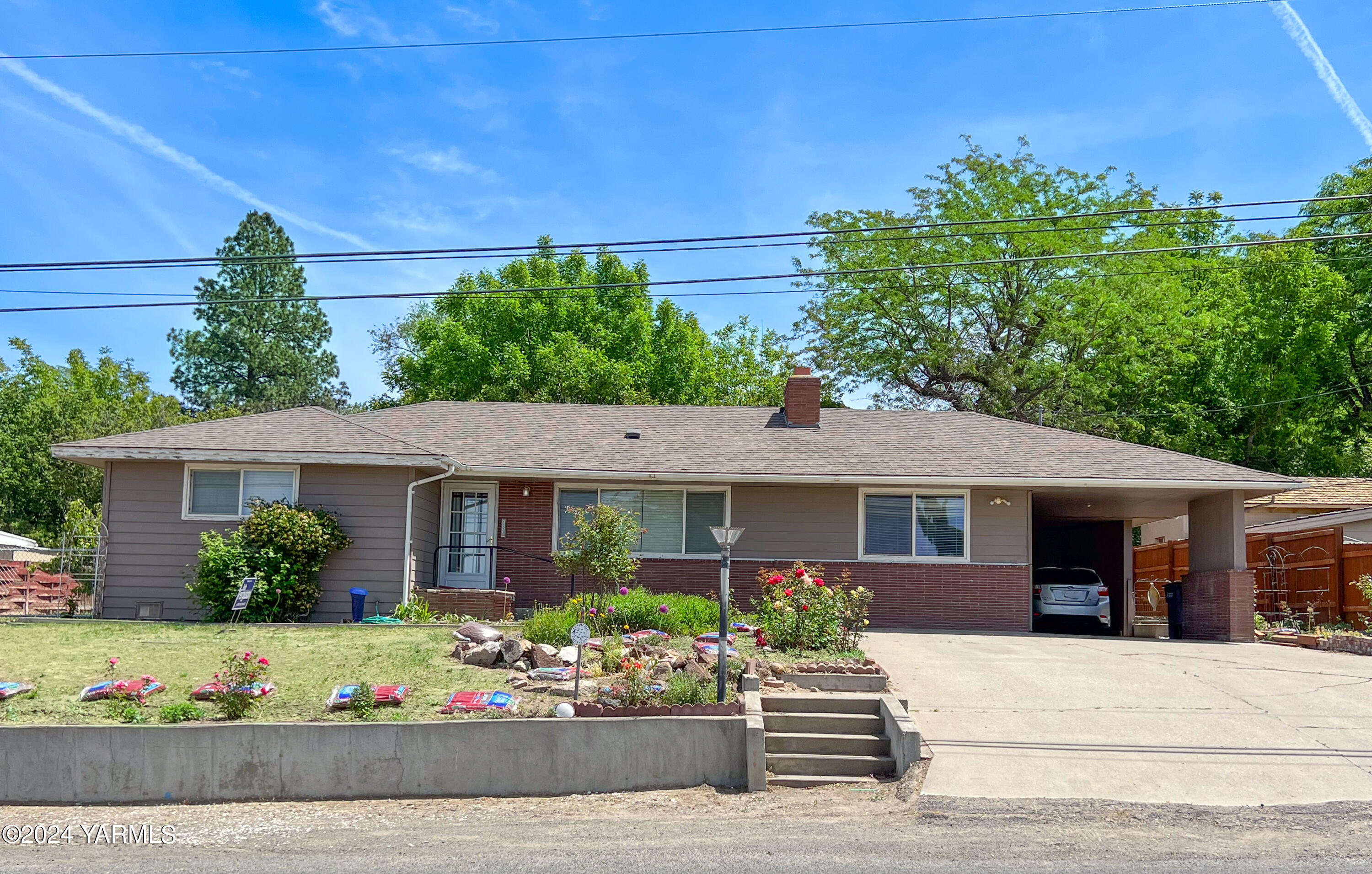 front view of a house with a small yard