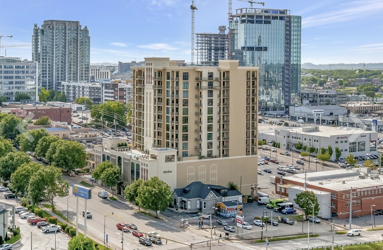 a view of a city with tall buildings