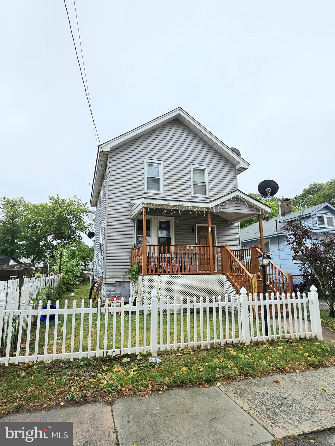 a front view of a house with a porch