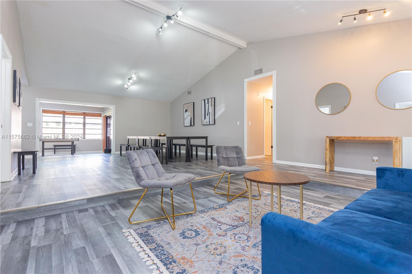 a view of a livingroom and dining room