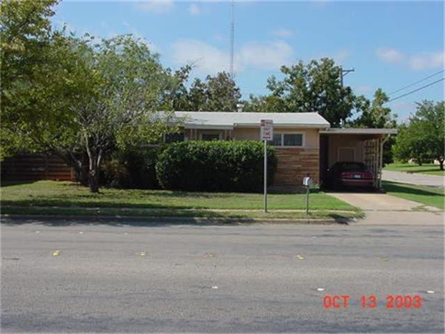 a house view with a garden space