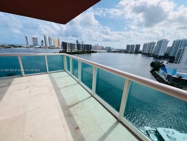 a view of a swimming pool with a lounge chairs