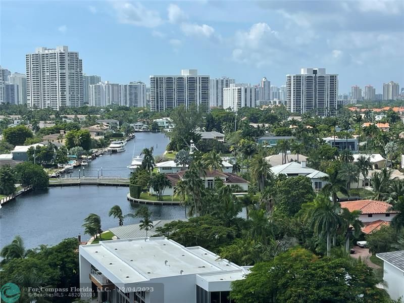 a view of a city with tall buildings