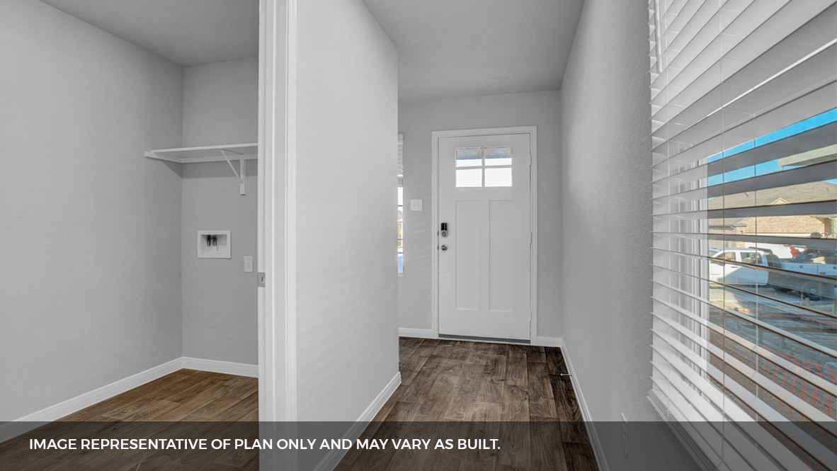 a view of hallway with wooden floor