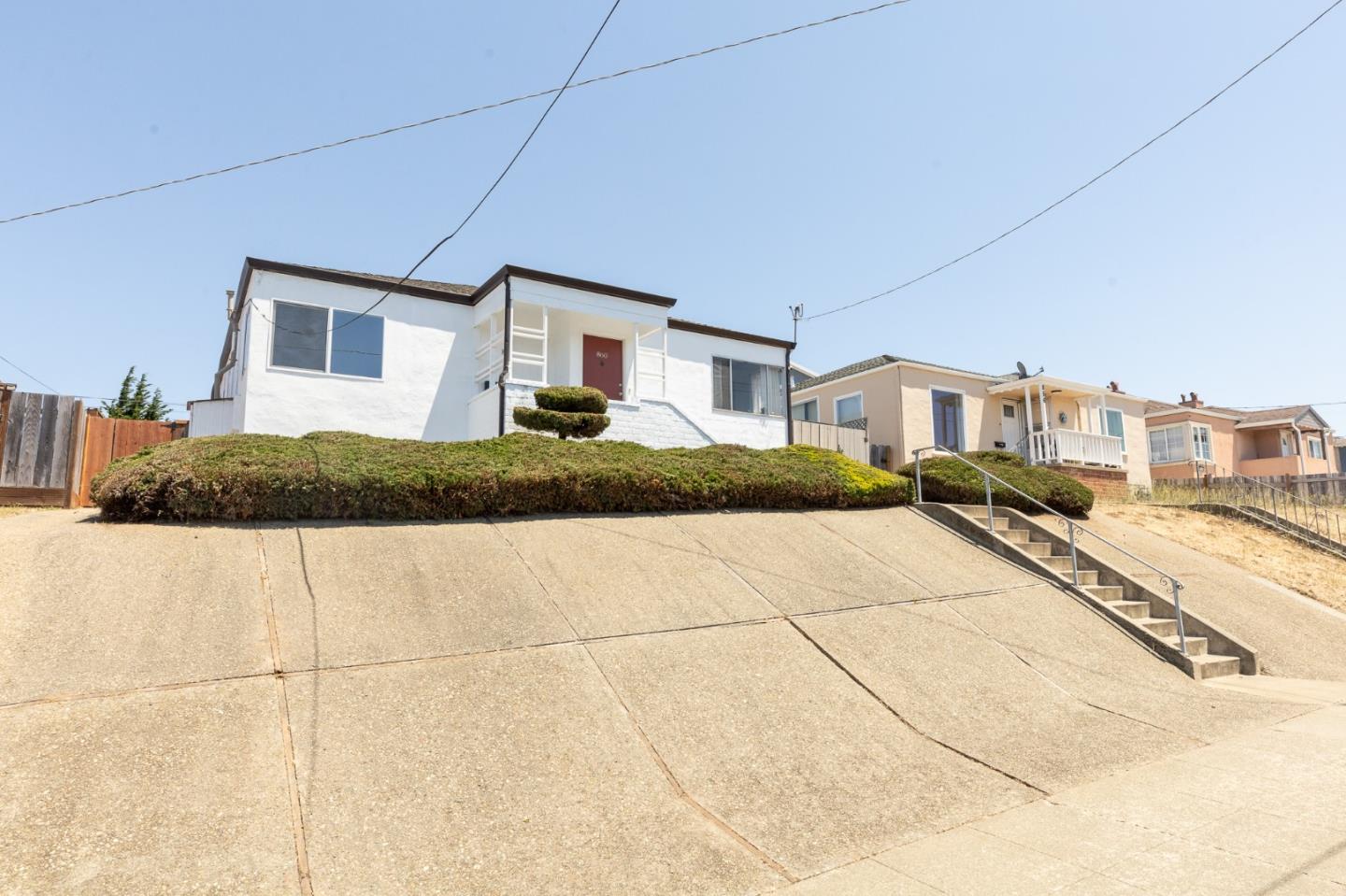 a house view with a outdoor space