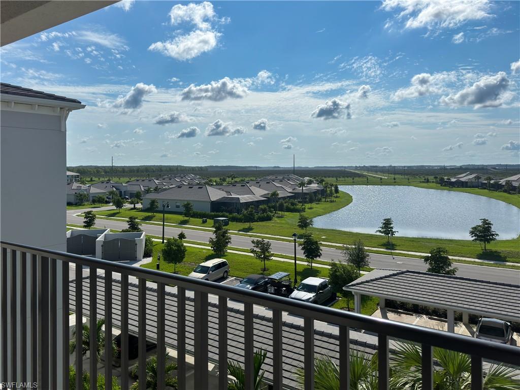 a view of swimming pool from a balcony