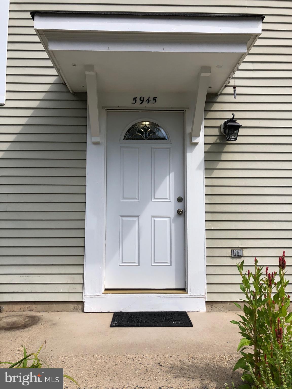 a front view of a house with entryway