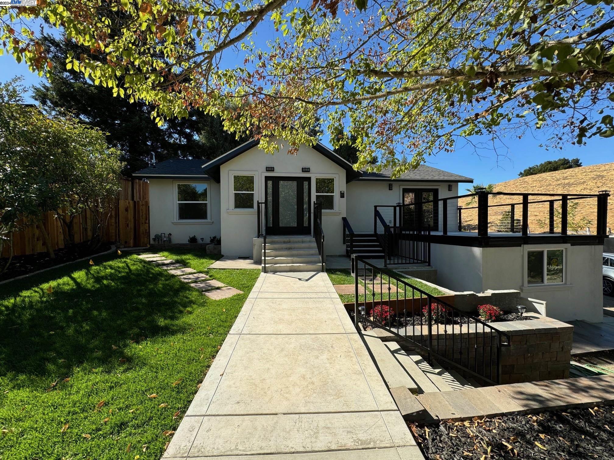 a front view of house with yard entertaining space