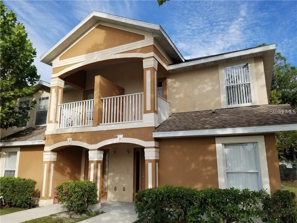 a front view of a house with garage