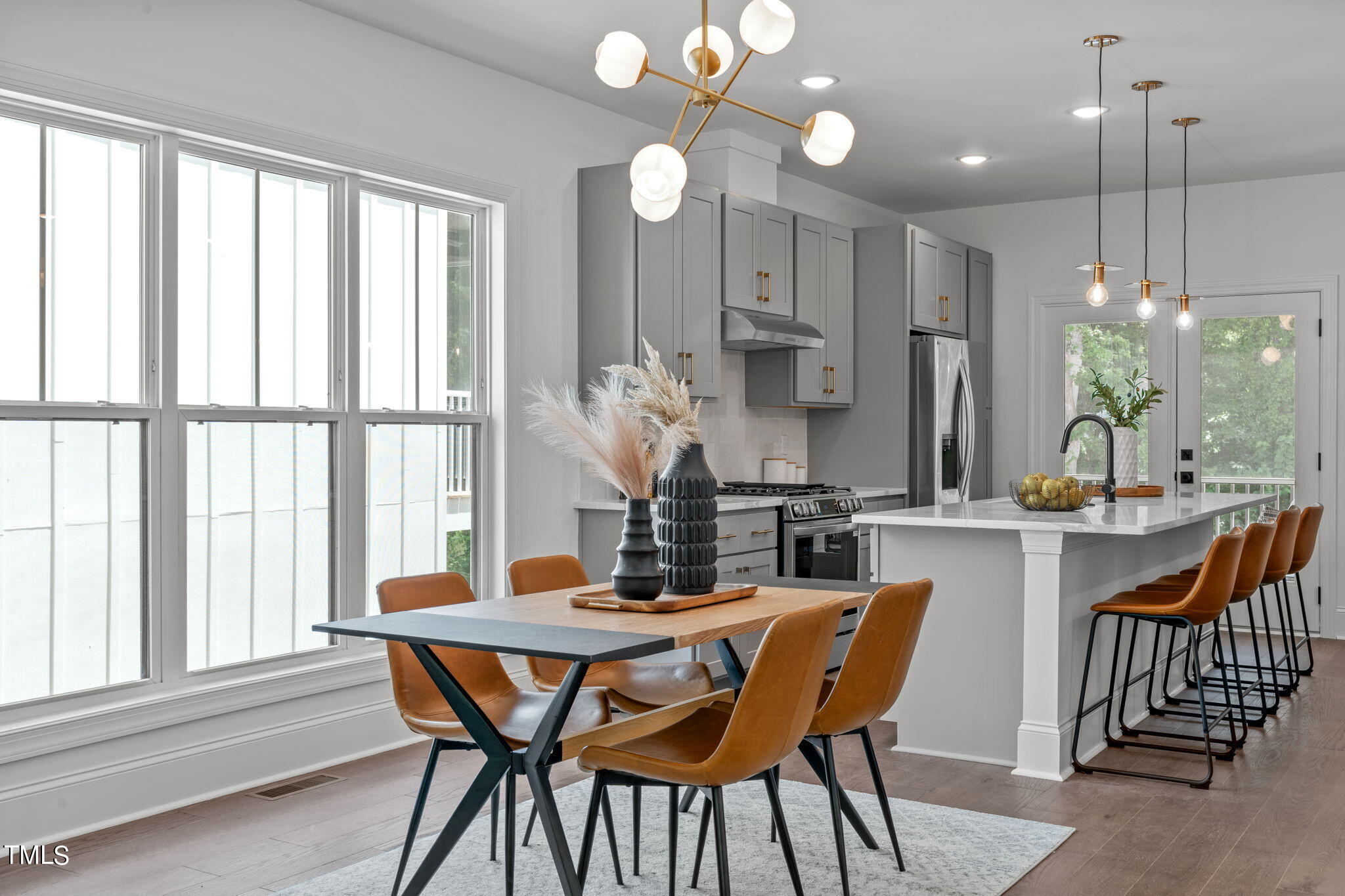 a dining room with furniture and window