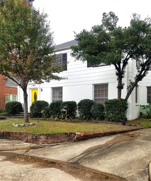 Front elevation as viewed from Wroxton Court street.  Duplex located at front with townhouse at rear separated by a courtyard