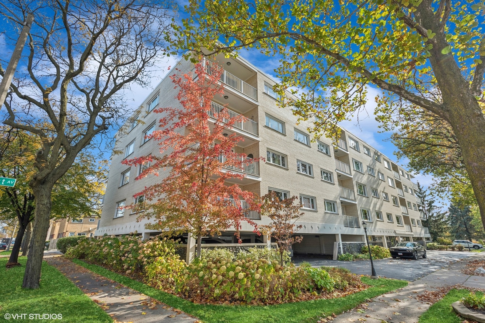 a view of a building with a yard